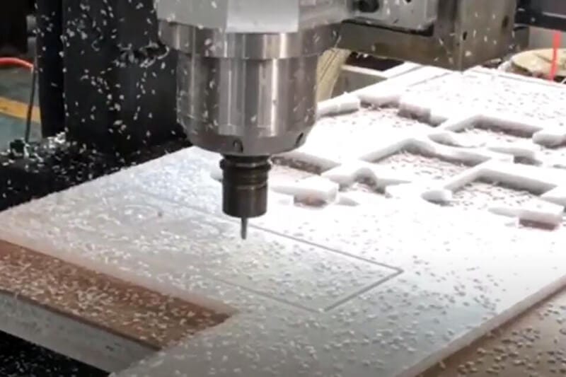 Engraving Machine Cuts Acrylic Sheet